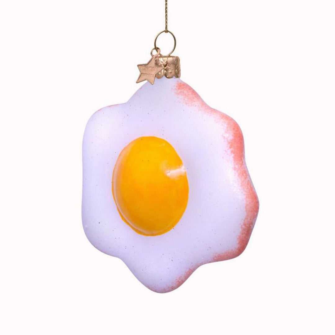 Inject some sparkly fun into your Christmas tree with this hand painted and mouth blown glass Fried Egg&nbsp;ornamental Christmas tree decoration by Vondels.