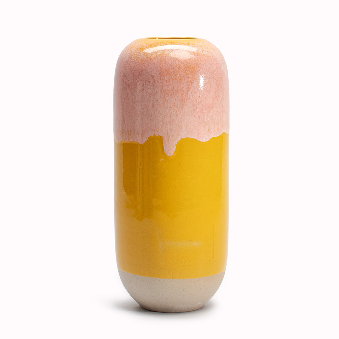Studio Arhoj's Japanese inspired vases are named after the Japanese word for snow. The yellow over pink hued Fruit Jelly Flux design is hand-thrown in watertight stoneware