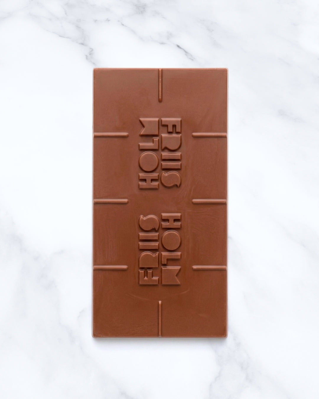 Friis-Holm Chokolade is a Danish bean-to-bar chocolate maker known for producing small-batch chocolate with a strong focus on cacao genetics, sourcing transparency, and flavour precision.