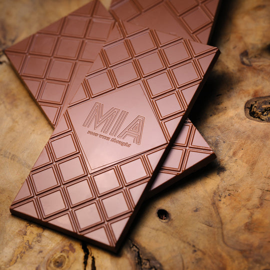Creamy Cashew M!lk Chocolate bar from MIA. Roasted cashews are ground into dark chocolate to create a creamy texture and an infusion of nutty notes nested in the earthy flavour of pure roasted cocoa.
