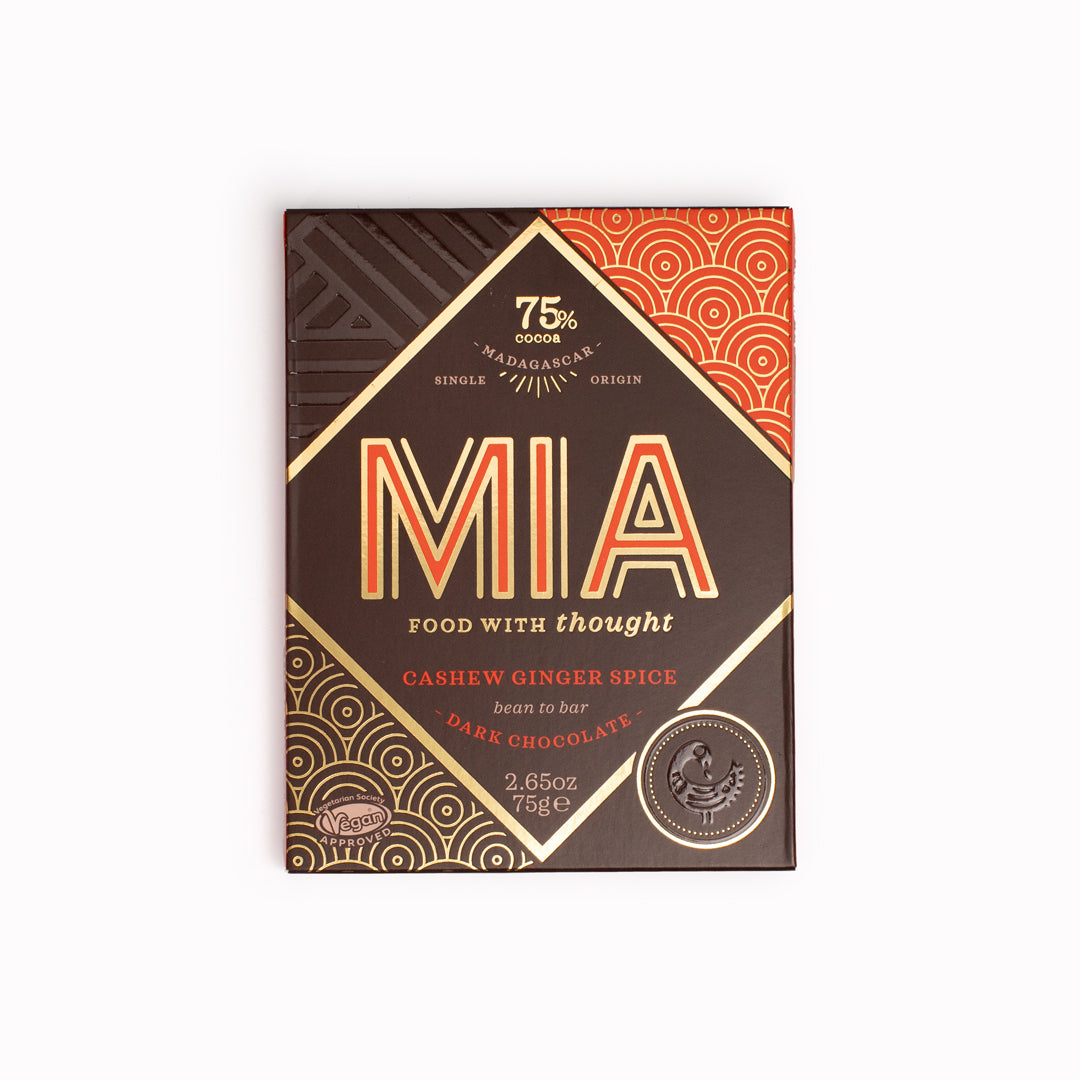 MIA's Ghana Gold, Ginger and Cashew Milk single origin Bean-to-Bar Chocolate bar is the marriage of gently roasted cashews and pronounced ginger spice, creating a chocolate with a rich fudge base and peppery finish.