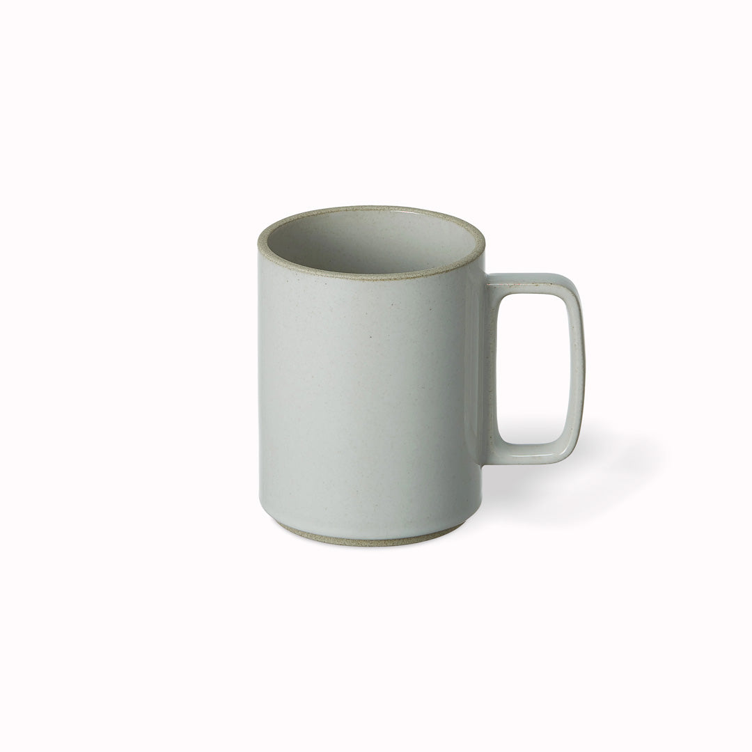 The large gloss grey porcelain mug by Hasami Porcelain is a tall stackable mug for hot drinks such as tea or coffee