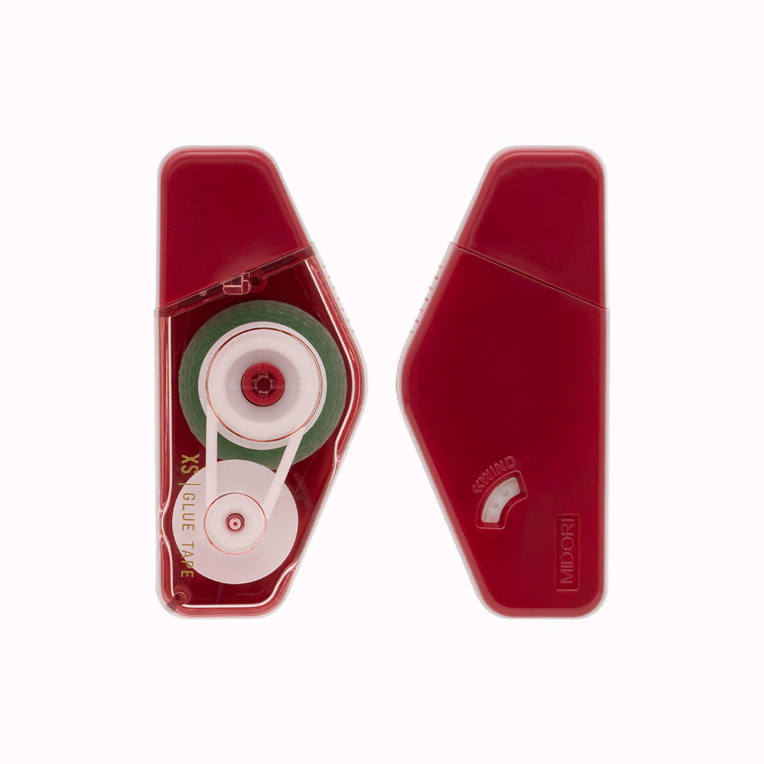 Glue tape dispenser from Midori's design award winning XS range. The small ergonomic design fits neatly in your hand and accurately dispenses a thin line of double sided tape when pressed run along a hard surface.