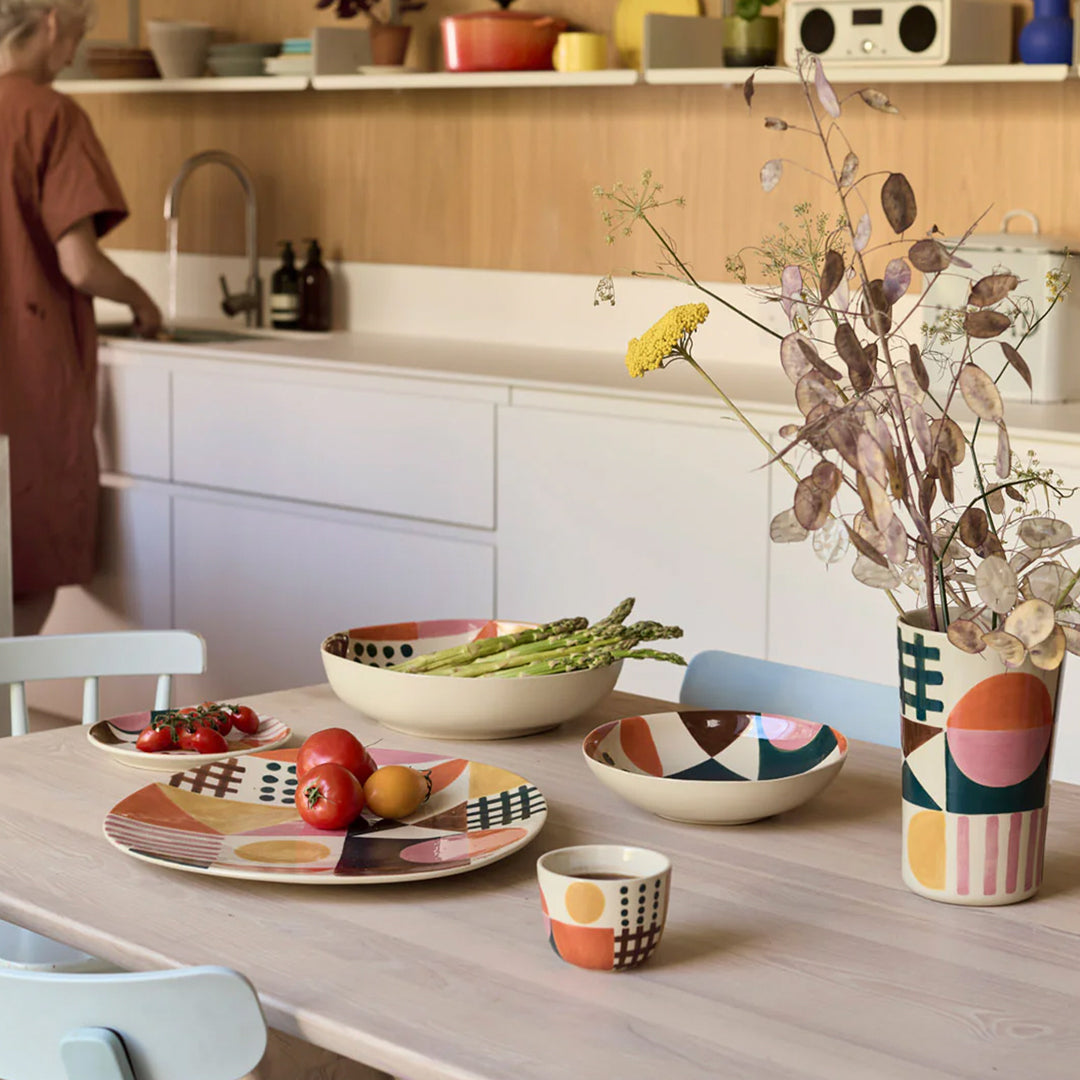 The Glypha Stoneware Vase is new for AW25 by Donna Wilson and features a colourful abstract design in typical Donna Wilson style.