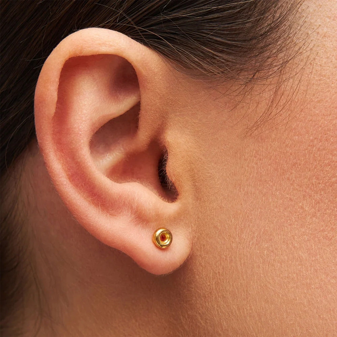 The Lulu Donut single stud earring has a brushed gold plated finish over sterling silver and with all Lulu Copenhagen's jewellery, it is is nickel free.