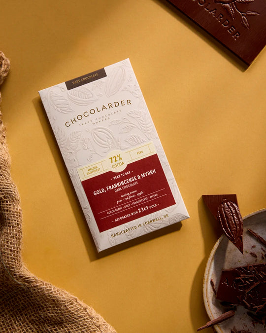 Gold Frankincense And Myrrh 72% Dark Chocolate Bar is a unique and particularly bar of chocolate from the award winning Chocolarder team featuring edible 23ct gold leaf. Perfect for a Christmas treat!