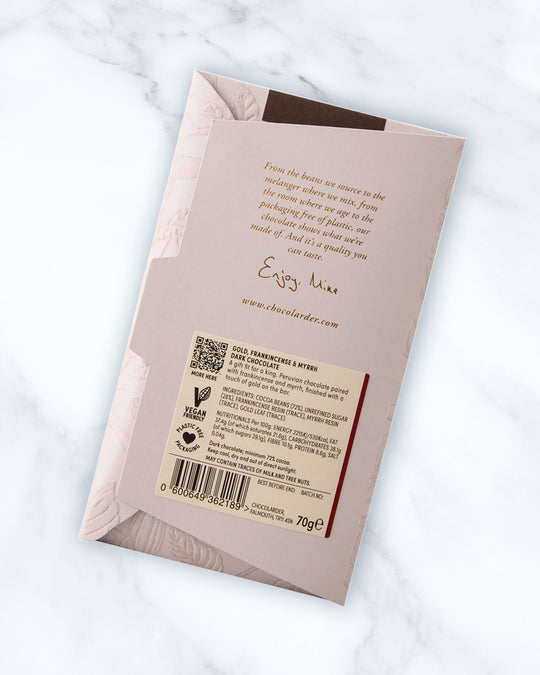 Gold Frankincense And Myrrh 72% Dark Chocolate Bar is a unique and particularly bar of chocolate from the award winning Chocolarder team featuring edible 23ct gold leaf. Perfect for a Christmas treat!