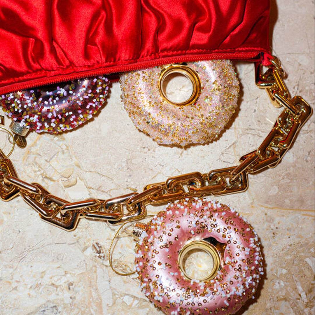 Inject some sparkly fun into your Christmas tree with this hand painted and mouth blown glass Gold Donut ornamental Christmas tree decoration by Vondels