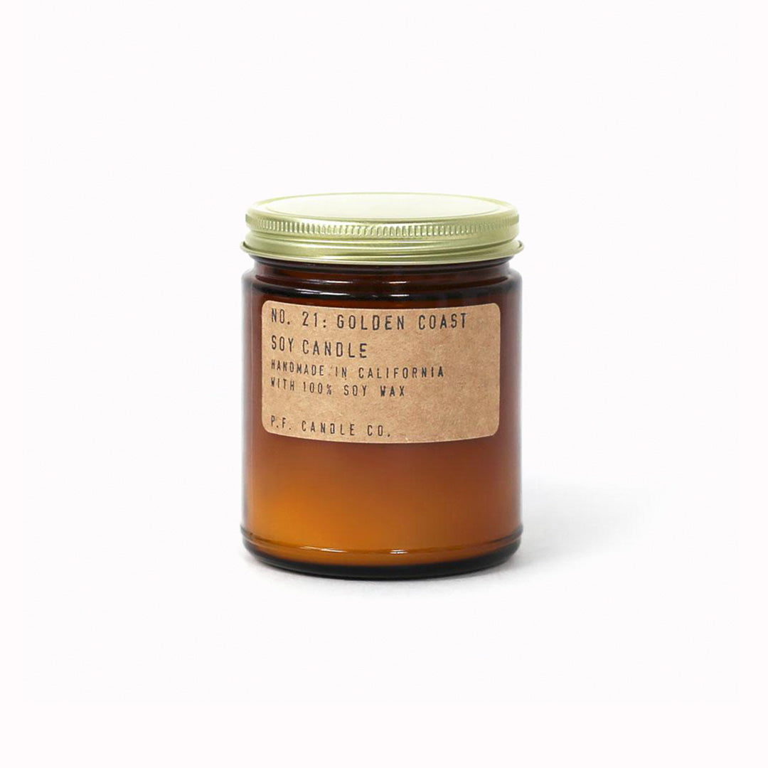 Golden Coast scented candle forms part of the core collection from P.F. Candle Co. These classic fragranced candles are hand poured into apothecary inspired amber jars with signature kraft label and brass lid which give a warm, comforting glow and divine scent.
