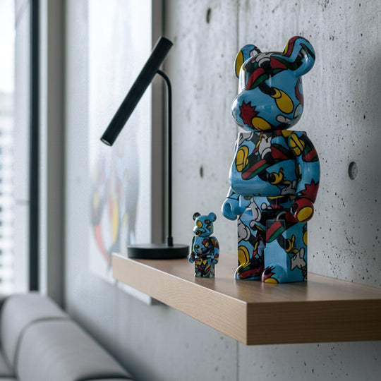 Grafflex Bearbrick 400% figurine on a wooden shelf with a modern interior background