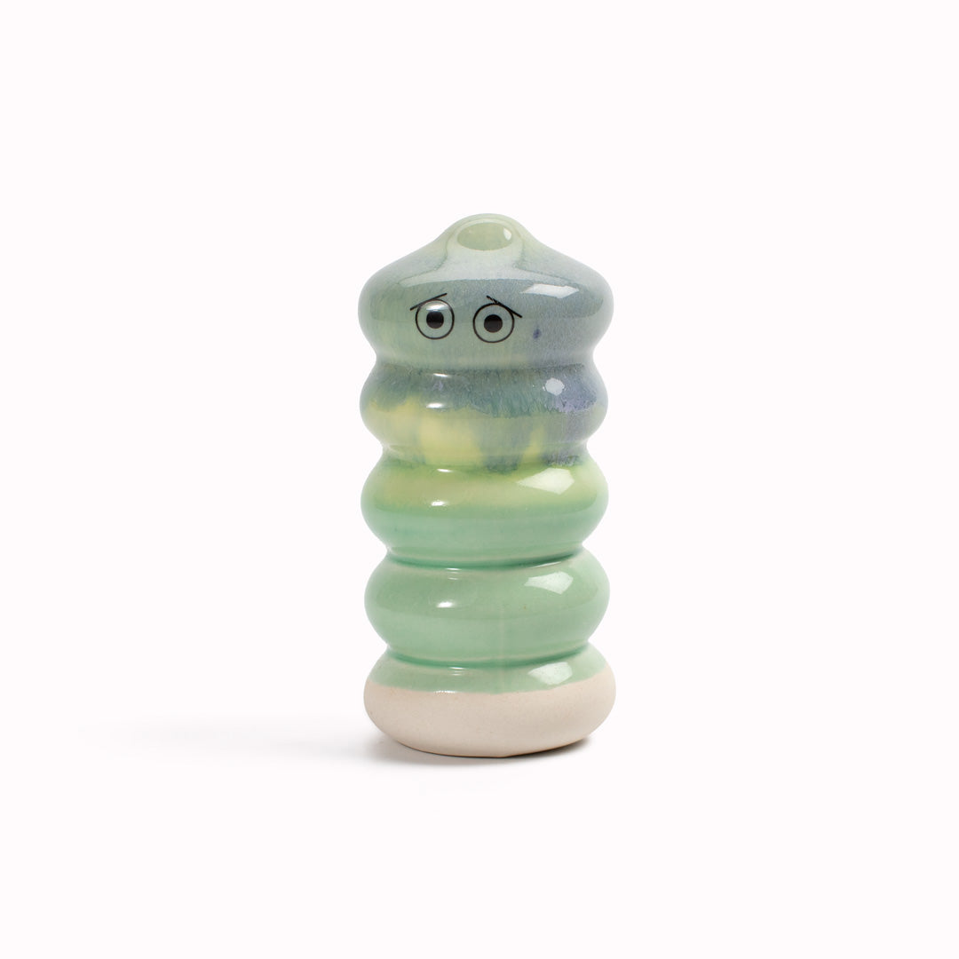 Meet Buru! Buru is a ridged cylinde shaped, hand glazed ceramic figurine created as a close relative of the classic Arhoj Ghost.
