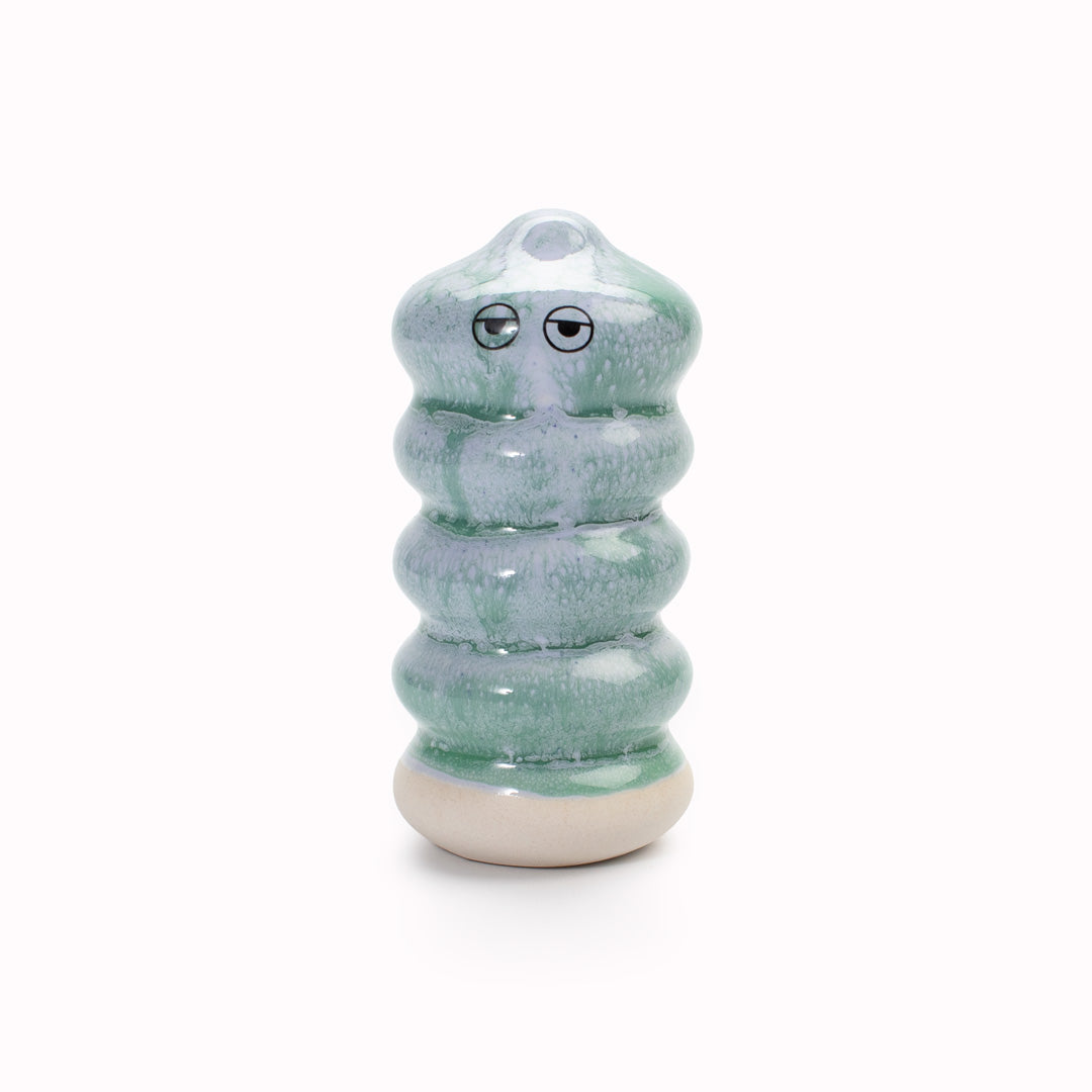 Meet Buru! Buru is a ridged cylinde shaped, hand glazed ceramic figurine created as a close relative of the classic Arhoj Ghost.