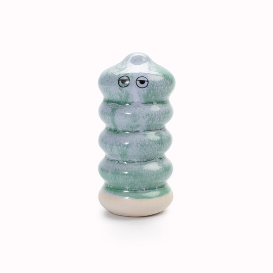 Meet Buru! Buru is a ridged cylinde shaped, hand glazed ceramic figurine created as a close relative of the classic Arhoj Ghost.