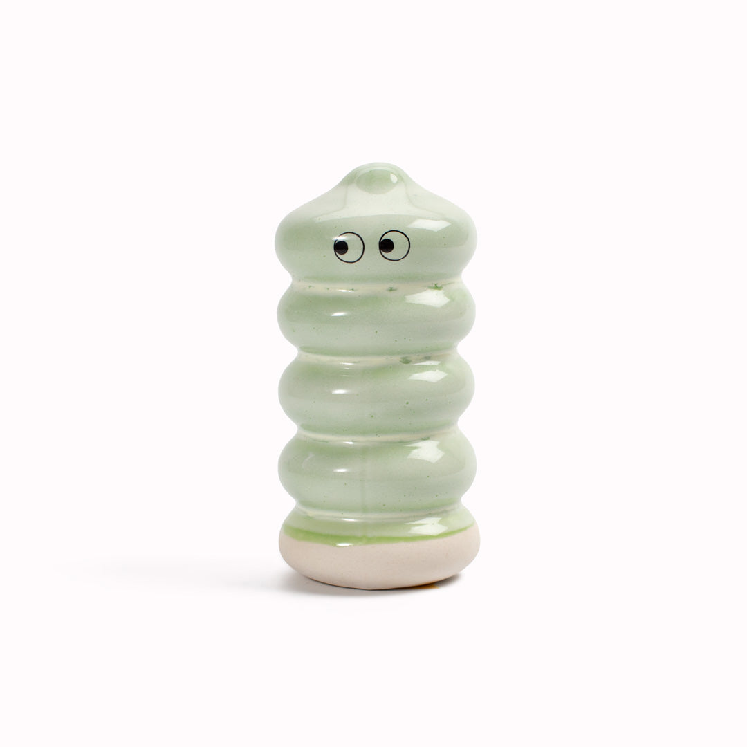 Meet Buru! Buru is a ridged cylinde shaped, hand glazed ceramic figurine created as a close relative of the classic Arhoj Ghost.