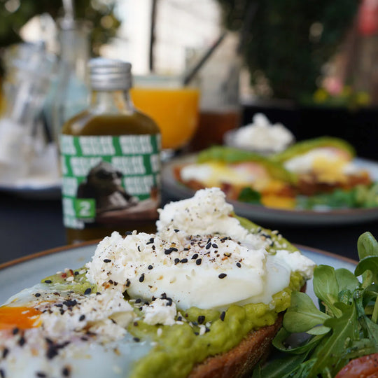 Green Bastard is a fresh, tangy chilli sauce built around pickled jalapeño chillies. on eggs

