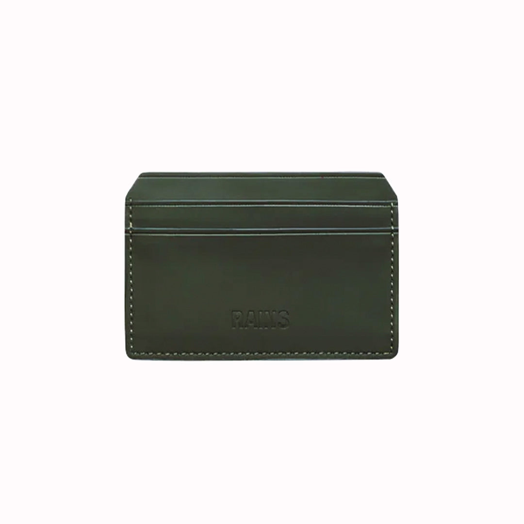 Card Holder in Green is crafted from Rains’ signature water-resistant fabric with a matte finish, engineered for strength, durability and smooth feel. Their minimal take on the credit card wallet. A vegan card holder with four card slots, two on each side, with a central slot for more cards or cash notes. 