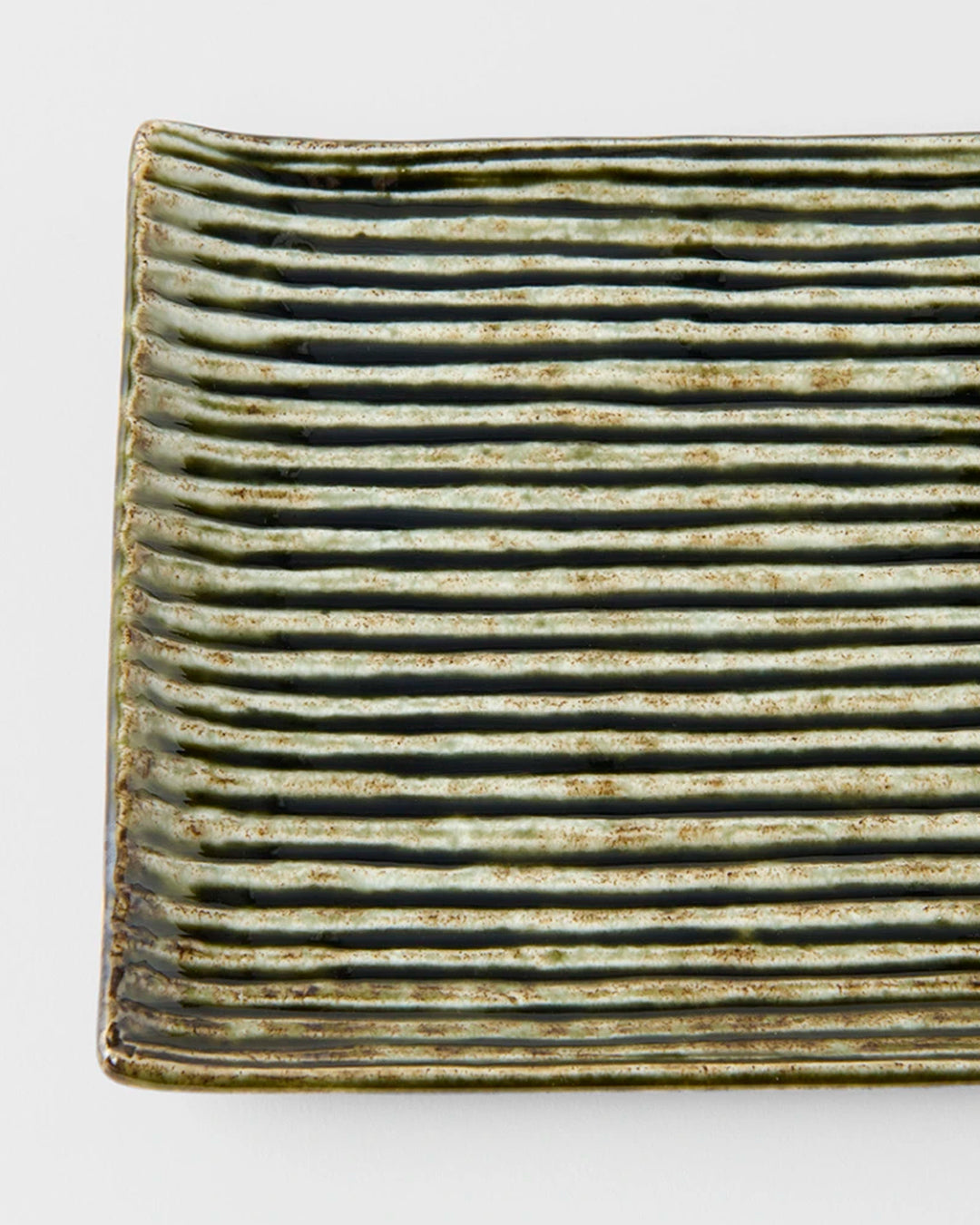 Rectangular Sushi Plate with a Green and White Contoured Glaze offering plenty of space for sashimi or other appetisers.