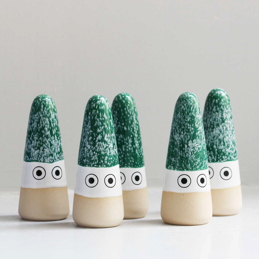 The Mini Nisse by Studio Arhoj are smaller, cuter versions of the iconic ceramic Arhoj Ghost figurine, in traditional Christmas colours. Collection Image