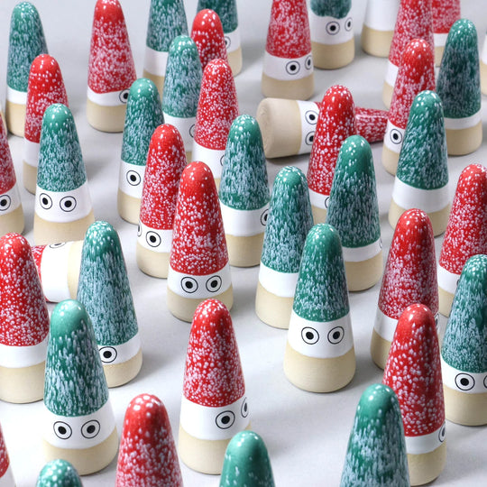 The Mini Nisse by Studio Arhoj are smaller, cuter versions of the iconic ceramic Arhoj Ghost figurine, in traditional Christmas colours. Collection Image