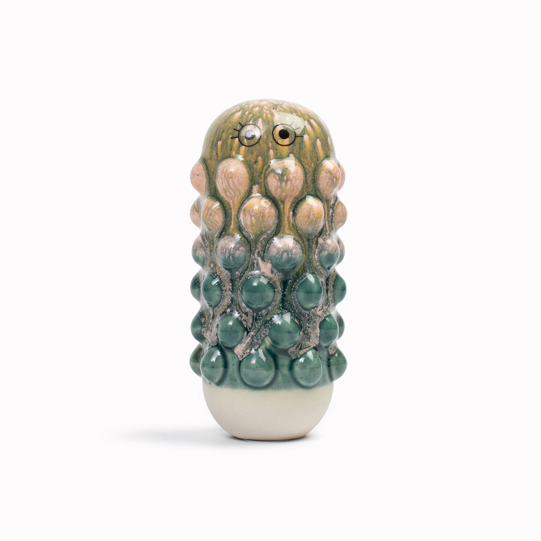 Meet Mimi! Mimi is a barnacle encrusted, bobbly, hand glazed ceramic figurine created as a close relative of the classic Arhoj Ghost. 