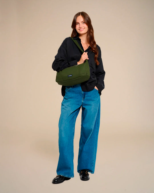The Mini Charlot is a compact shoulder bag large enough for all your daily essentials. For AW26 the bag is made from a 100% organic cotton canvas fabric with a water resistant coating