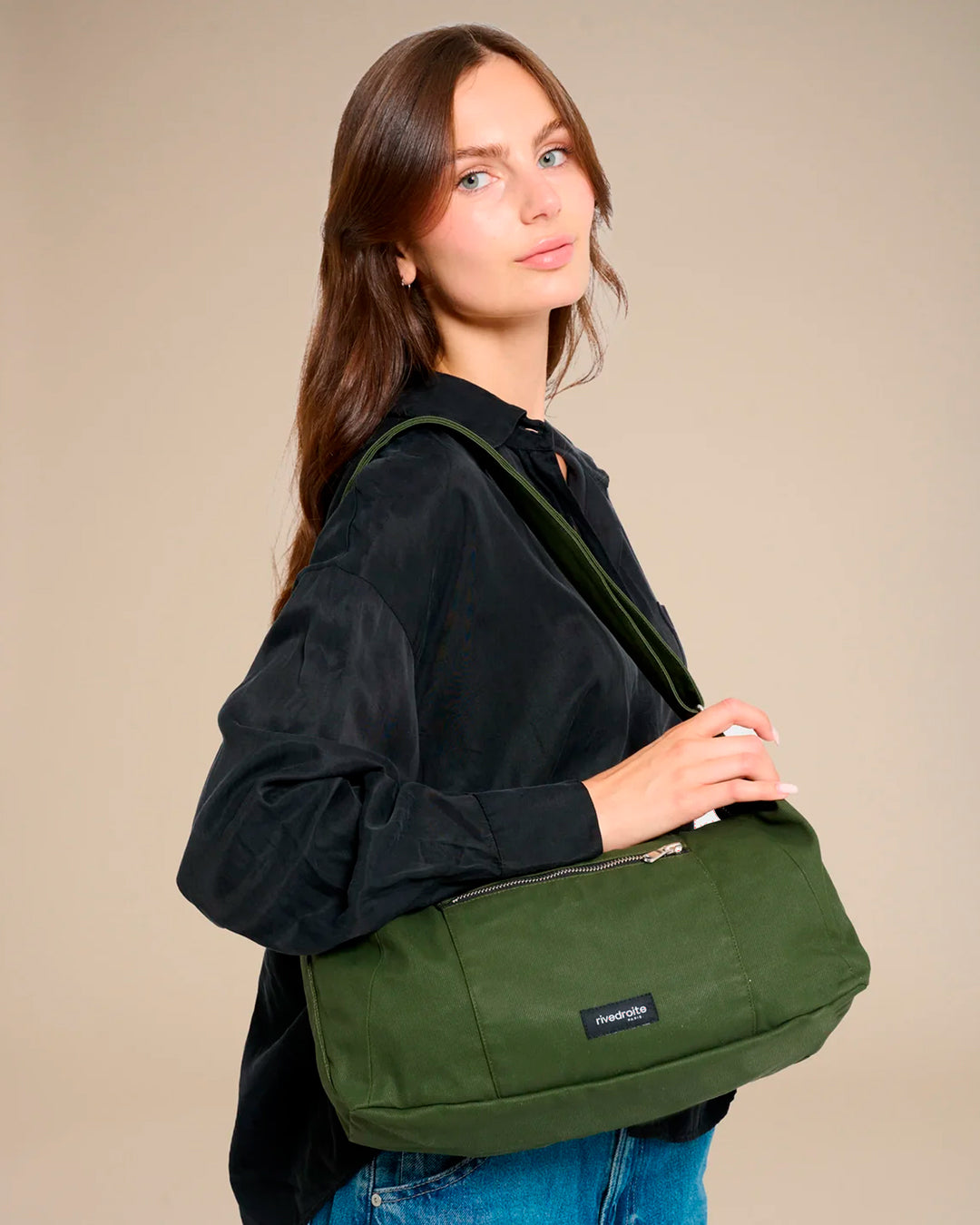 The Mini Charlot is a compact shoulder bag large enough for all your daily essentials. For AW26 the bag is made from a 100% organic cotton canvas fabric with a water resistant coating
