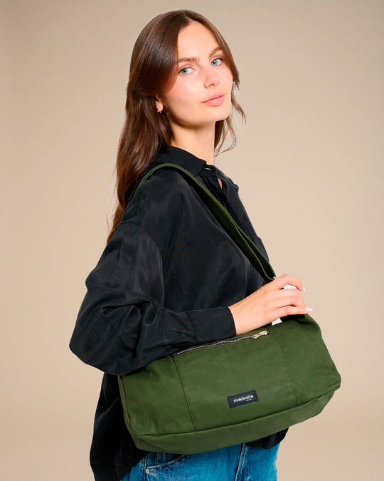 The Mini Charlot is a compact shoulder bag large enough for all your daily essentials. For AW26 the bag is made from a 100% organic cotton canvas fabric with a water resistant coating