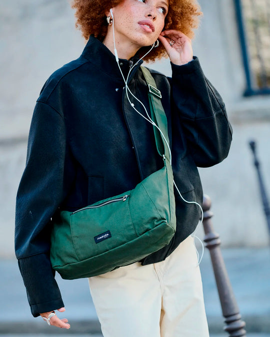 The Mini Charlot is a compact shoulder bag large enough for all your daily essentials. For AW26 the bag is made from a 100% organic cotton canvas fabric with a water resistant coating