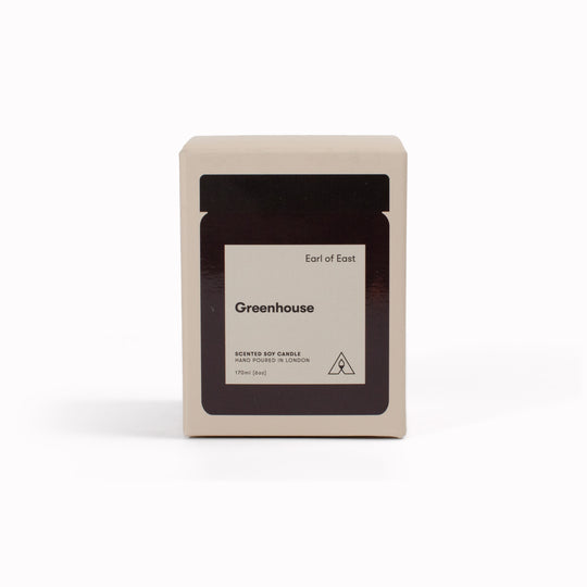 The Greenhouse candle by Earl of East is a hand-poured soy wax candle that captures the essence of summer in Northern Greece. 