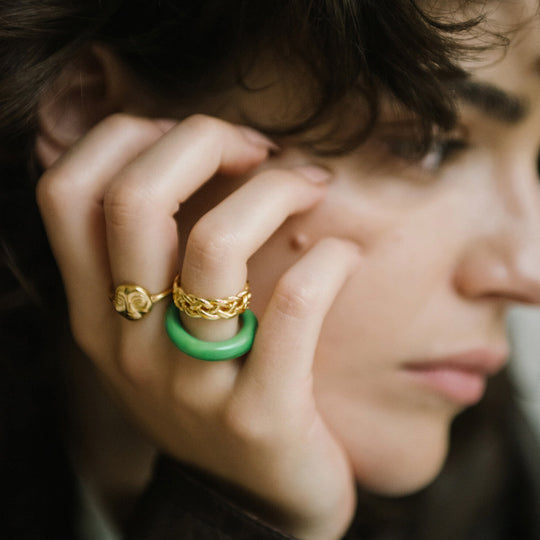 As worn by model, Grete is a green handblown glass ring, handmade by Eyland Jewellery, who produce contemporary and colourful pieces of costume jewellery.