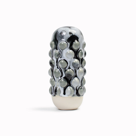 Meet Mimi! Mimi is a barnacle encrusted, bobbly, hand glazed ceramic figurine created as a close relative of the classic Arhoj Ghost. 