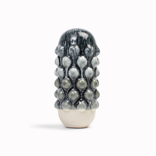 Meet Mimi! Mimi is a barnacle encrusted, bobbly, hand glazed ceramic figurine created as a close relative of the classic Arhoj Ghost. 