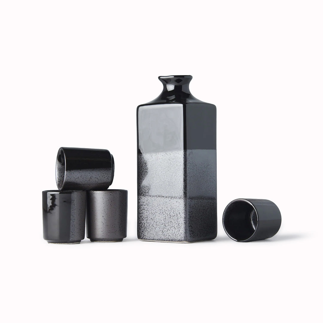 This elegant set, crafted from high-quality Minoyaki porcelain, features a striking gunmetal and black finish, making it a sophisticated addition to any table