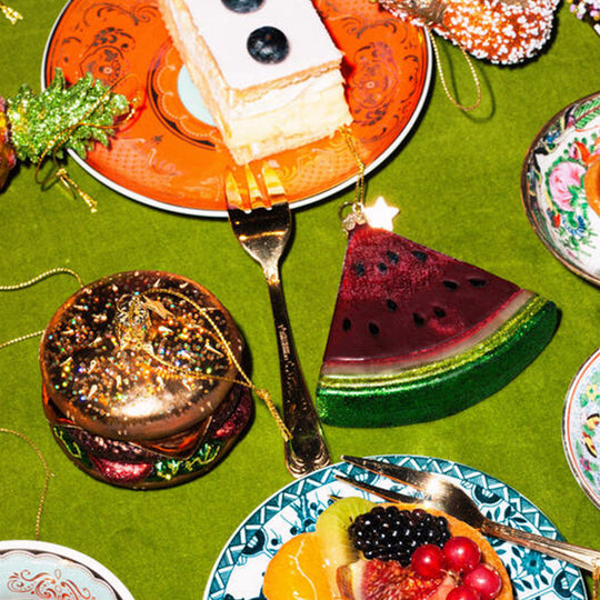 Inject some sparkly fun into your Christmas tree with this hand painted and mouth blown glass Hamburger ornamental Christmas tree decoration by Vondels.