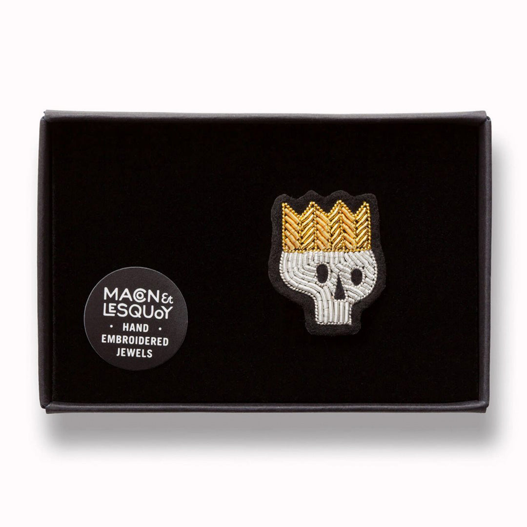 Beautiful Hamlet Skull in box. Hand embroidered decorative lapel pin by Paris based Macon et Lesquoy - personalise your favourite garments to define your individual style.  This design is from the London Twist collection.