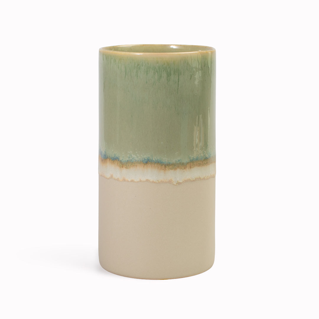 Extra Large Porcelain cylinder vase from London based SGW Lab, glazed in shades of pistachio green, indigo on an earthy natural base.