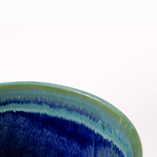 Extra Large Porcelain cylinder vase from London based SGW Lab, glazed in tonal shades of green through to blue.