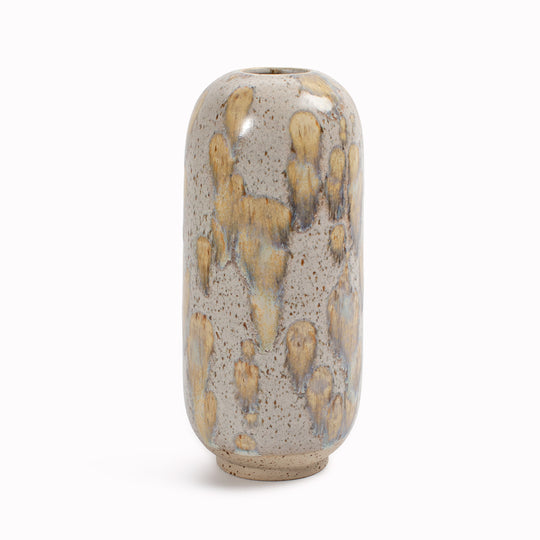 The Harbor Seal Yuki Vase design is hand-thrown in watertight stoneware and has a neutral glaze with almost irridescent effect. Due to the rounded taper at the top of the vase