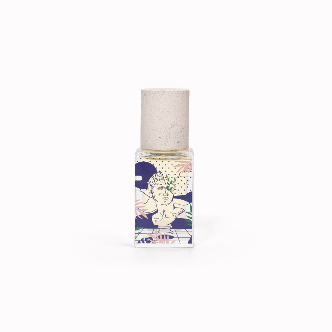 Maison Matine's 'Hasard Bazar' is a scent inspired by multi focus, multi disciplined passion and creativity, all housed in an illustrative glass bottle. 50ml Bottle shown, illustrated with face and leaves.