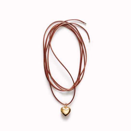 The Heart on a String necklace by Anni Lu is a charming piece that blends contemporary design with classic elegance.
