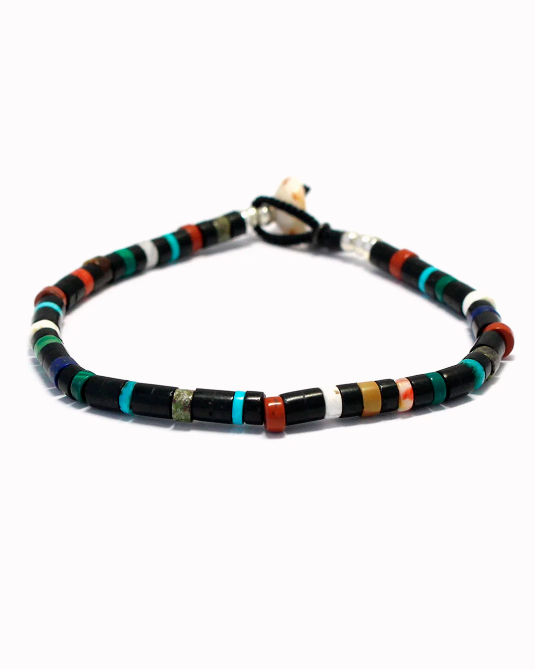 Mikia's handmade Bead bracelet combines black jet with an irregular mix of colour natural stones and shell to create a distinctive beaded necklace with rich variations in colour and texture.