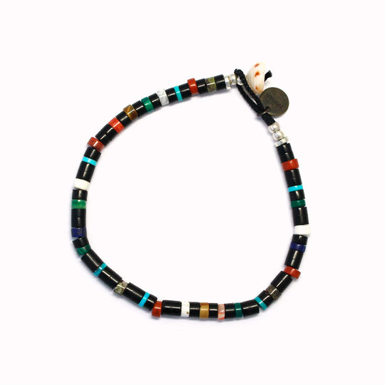 Mikia's handmade Bead bracelet combines black jet with an irregular mix of colour natural stones and shell to create a distinctive beaded necklace with rich variations in colour and texture.
