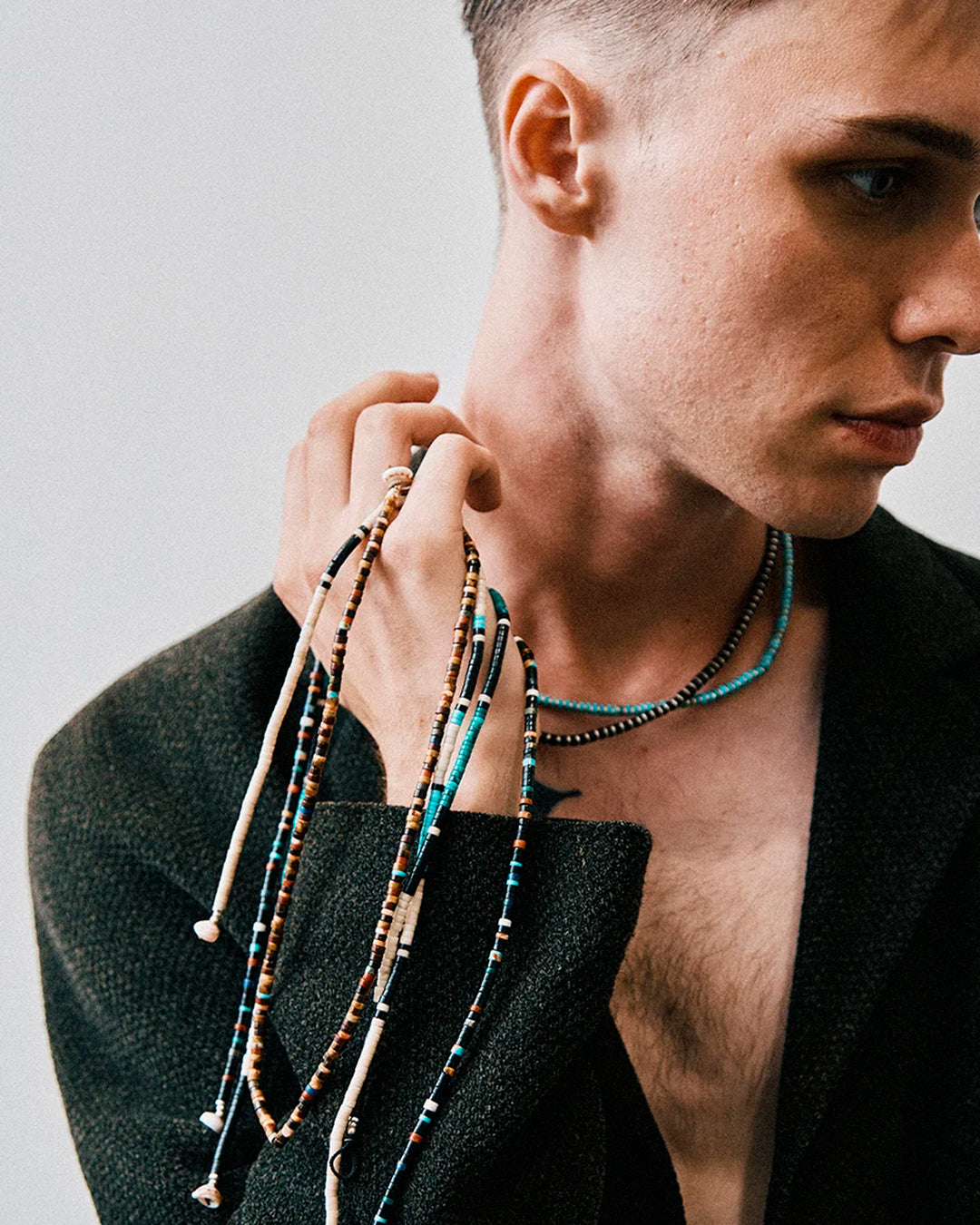 Mikia's handmade Jet Multi Heishi Bead necklace combines black jet with an irregular mix of colour natural stones and shell to create a distinctive beaded necklace with rich variations in colour and texture.&nbsp;