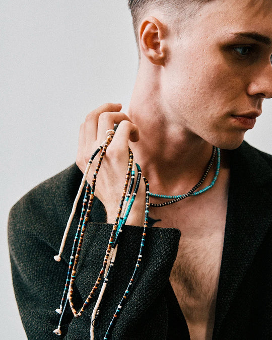 Mikia's handmade Jet Multi Heishi Bead necklace combines black jet with an irregular mix of colour natural stones and shell to create a distinctive beaded necklace with rich variations in colour and texture.&nbsp;