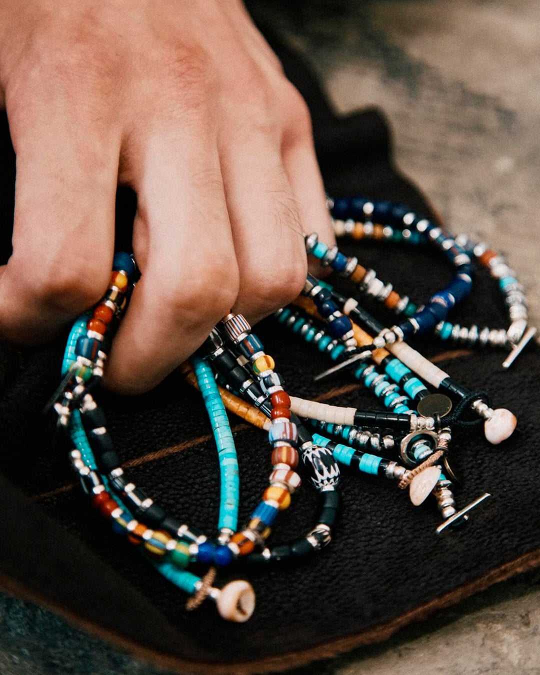 Mikia's handmade Jet Multi Heishi Bead necklace combines black jet with an irregular mix of colour natural stones and shell to create a distinctive beaded necklace with rich variations in colour and texture.&nbsp;