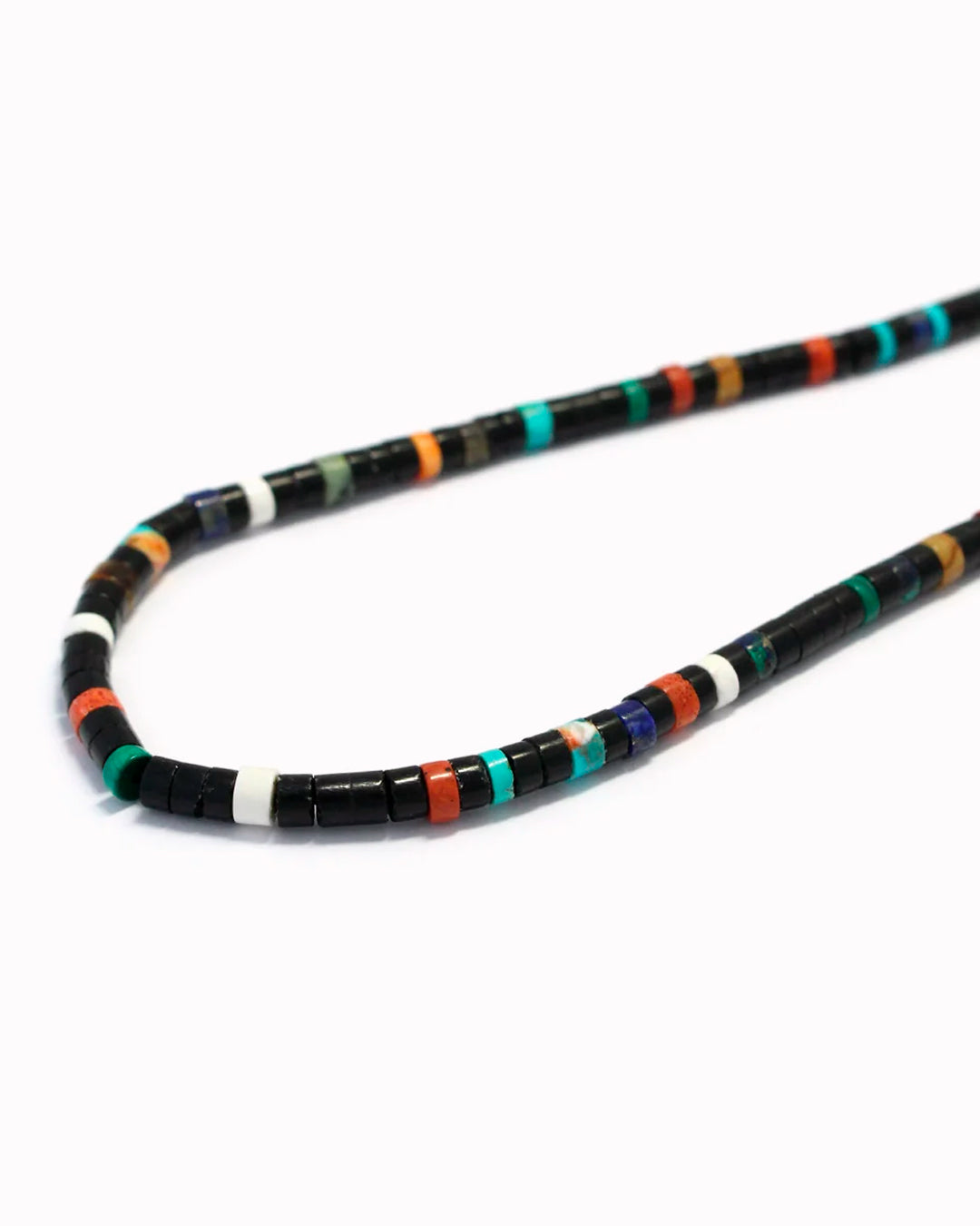 Mikia's handmade Jet Multi Heishi Bead necklace combines black jet with an irregular mix of colour natural stones and shell to create a distinctive beaded necklace with rich variations in colour and texture.&nbsp;