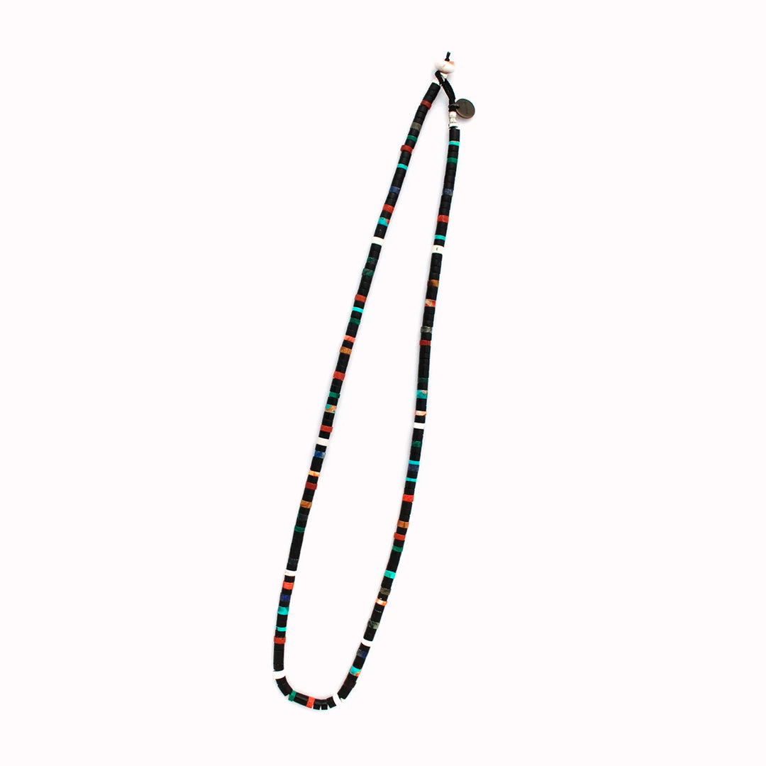 Mikia's handmade Jet Multi Heishi Bead necklace combines black jet with an irregular mix of colour natural stones and shell to create a distinctive beaded necklace with rich variations in colour and texture.&nbsp;