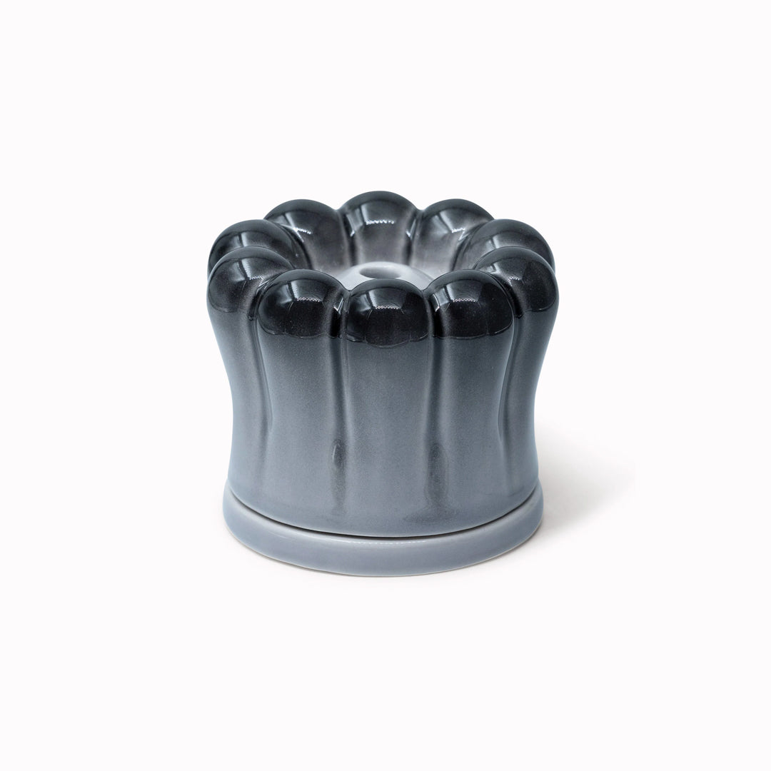 This Lamp is the big brother to the always popular Ghost Tea Light Lamp and is the perfect companion for desks, bookshelves or a windowsill.