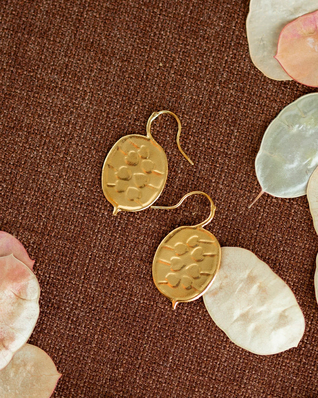 The Honesty Pod hook earrings are inspired by honesty pods (also known as silver dollars) with charming heart shaped seed detail.