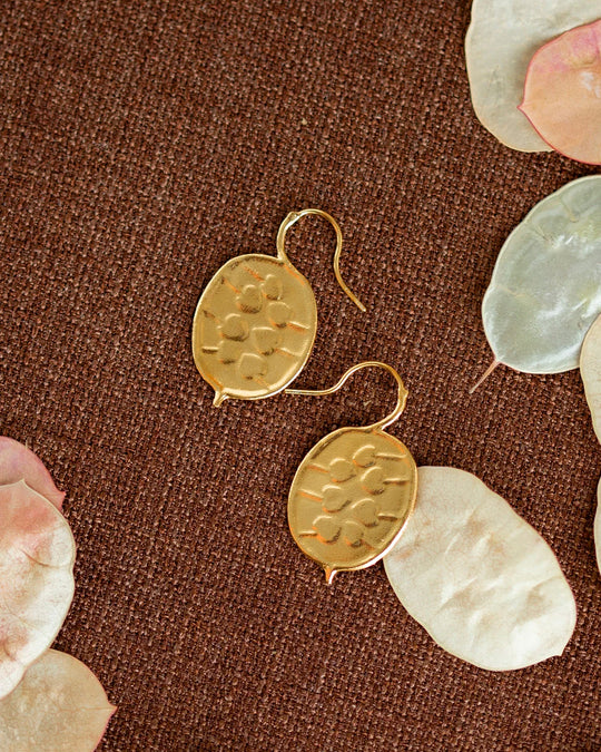 The Honesty Pod hook earrings are inspired by honesty pods (also known as silver dollars) with charming heart shaped seed detail.